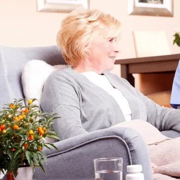 Lady in an arm chair