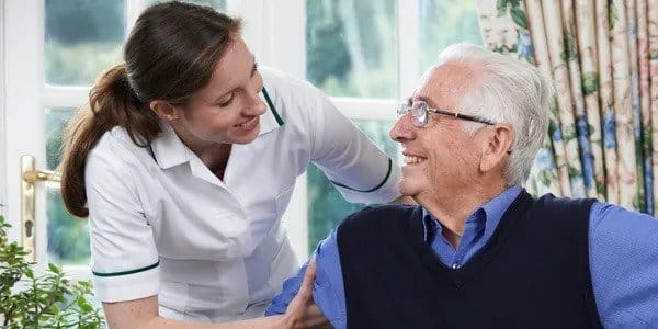 Carer and an elderly gentleman