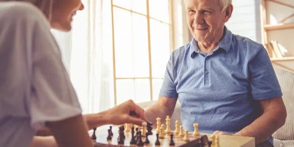 Couple play chess